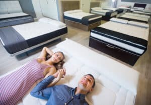 ordinary family choosing mattresses